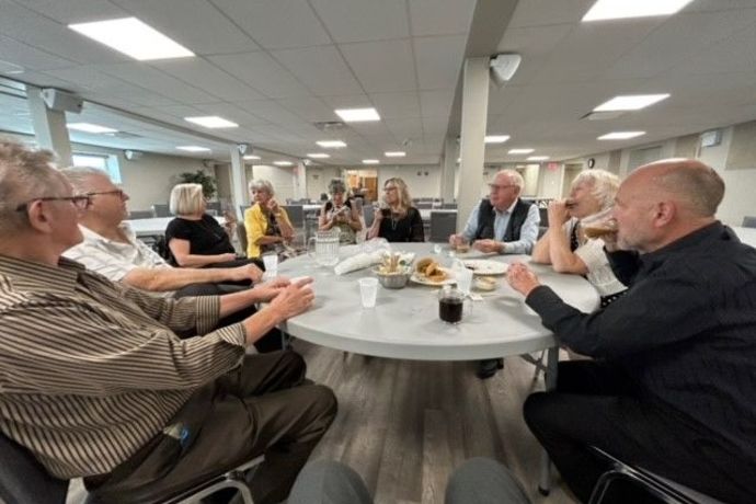 fellowship group around a table