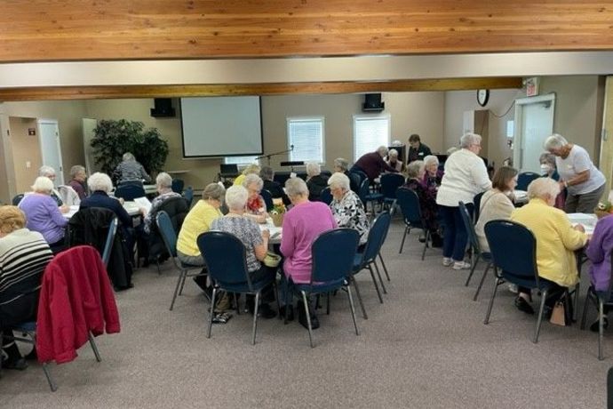 ladies groups meeting around tables