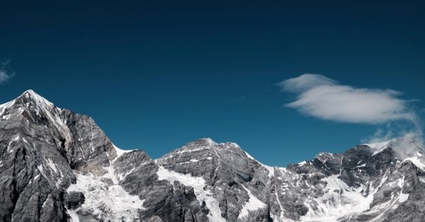 Mountain range with blue sky above